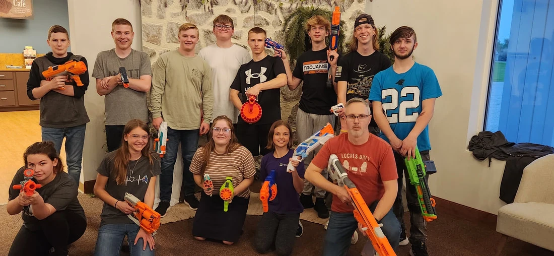 The Well group with Nerf blasters
