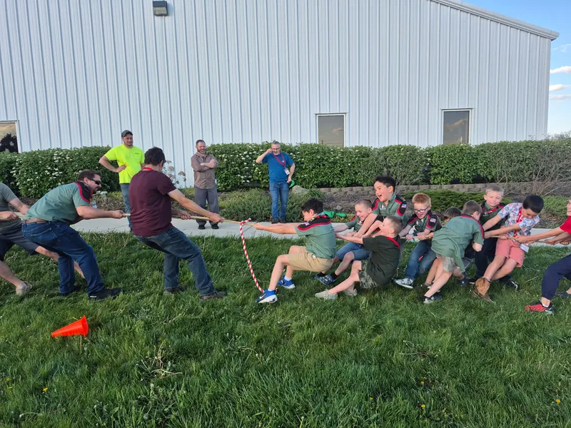 Troop OH-0317 taking part in an outdoor tug-of-war